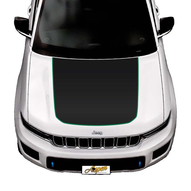 May include: A white Jeep with a black and green hood decal. The decal has a green outline and the Jeep logo is visible on the front grille.