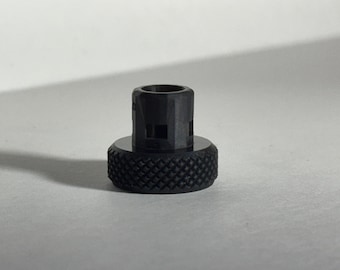 Desinflador de neumáticos con válvula de empuje