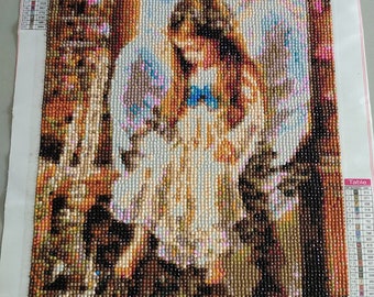 Little girl angel with dove over her completed diamond painting pic