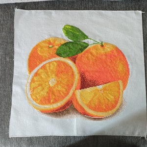 orange completed cross stitch