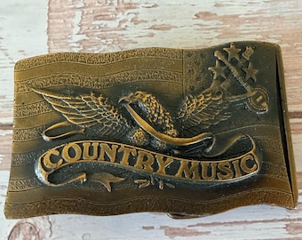 Vintage 1977 Indiana Metal Craft Country Music Belt Buckle Eagle Guitar Patriotic Western Brass Tone