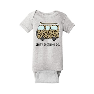 Surf Inspired Baby Onesie With A Hand Drawn Leopard Print Camper Van Design | The Perfect Onesie For Lovers of Surf, Vanlife & More!