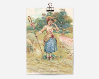 May include: A young girl in a blue and white dress and a straw hat with a pink flower holds a shepherd's crook in a field with green trees and a pink path.