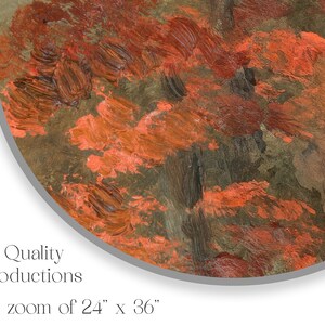 May include: Close-up of an abstract painting with thick brushstrokes in shades of orange, brown, and red. The painting has a textured surface and a circular shape.