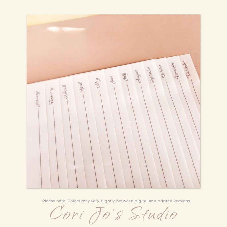 May include: A white sheet of paper with the months of the year written in cursive script. The paper is divided into sections for each month, with lines for writing.