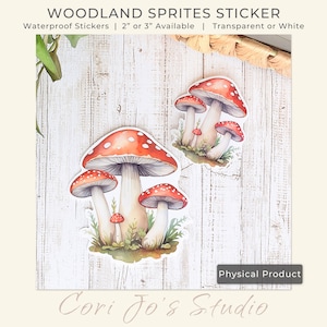 May include: A set of four watercolor mushroom stickers. The stickers are red with white spots and have white stems. The stickers are on a white wooden background. The text "WOODLAND SPRITES STICKER" is at the top of the image. The text "Waterproof Stickers | 2" or 3" Available | Transparent or White" is below the title. The text "Physical Product" is in a rectangle at the bottom of the image. The text "Cori Jo's Studio" is at the bottom of the image.