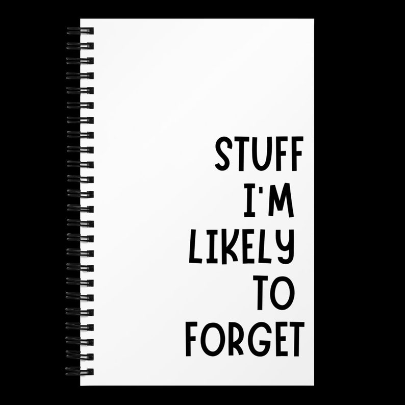 Puede incluir: Una libreta blanca de espiral con el texto "STUFF I'M LIKELY TO FORGET" impreso en negro.