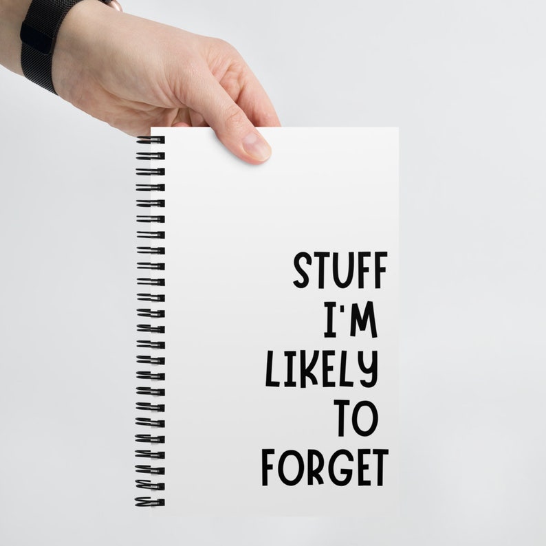Puede incluir: Una libreta blanca de espiral con texto negro que dice "Stuff I'm Likely To Forget".