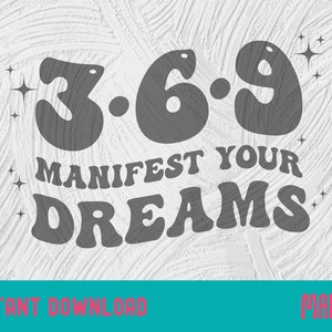 May include: A gray graphic design on a textured white background. The design features the numbers 3, 6, and 9 above the words "MANIFEST YOUR DREAMS" in a retro font. Small starbursts are scattered around the text.