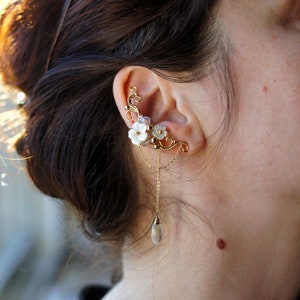 A pair of ear cuffs with flowers. no piercing earrings. romantic elf jewelry