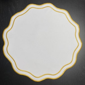 Waterproof placemats white and yellow embroidery on the border