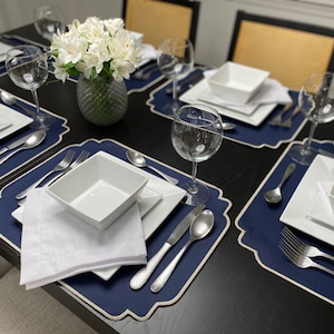 Blue placemat with embroidery light gray border