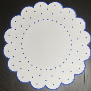 White and blue embroidery placemats