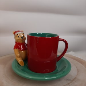 Winnie the Pooh coffee cup with Santa hat, Disney Store