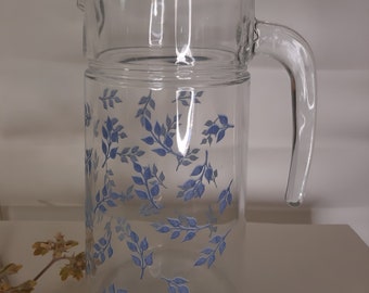 Juice or water jug, France, decoration with blue leaves, in glass, Vintage