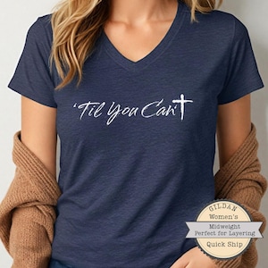 May include: Navy blue V-neck t-shirt with the white text "'Til You Can't" and a cross. The shirt is a Gildan Women's Midweight, perfect for layering. The shirt is a quick ship item.