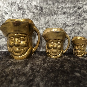 Brass Toby Jugs