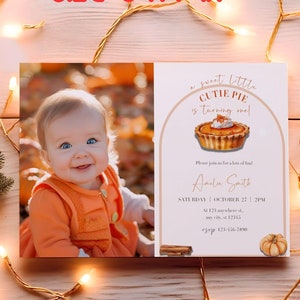 May include: A 5 x 7 inch invitation with a photo of a smiling baby in orange clothing. The invitation text reads "a sweet little cutie pie is turning one!" with event details and a pumpkin illustration. The text "DIY Invitation in Canva" is also present.