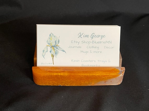 A business card holder made with real golden labradorite and copper flake resin — the kind of desk piece that makes clients ask where you got it.