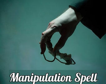 May include: A hand holding a dark string with a white object attached to it. The text "Manipulation Spell" is written below the hand.