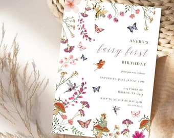 May include: A white invitation with a floral design featuring butterflies and fairies. The text reads "Avery's fairy first birthday, please join us to celebrate, Saturday, June 3rd at 2 PM, 123 Fairy Rd, Dallas, TX 12345, RSVP to Nicole by May 27th, 181-222-5555".