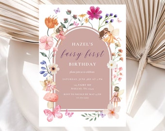 May include: A pink and white floral birthday invitation for a girl's first birthday party. The invitation features a whimsical fairy theme with fairies, flowers, and butterflies. The text on the invitation reads "Hazel's fairy first birthday, please join us to celebrate, Saturday, June 3rd at 2 PM, 123 Fairy Rd, Dallas, TX 12345, RSVP to Nicole by May 27th, 111-222-5553."