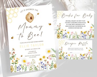 May include: A baby shower invitation featuring a beehive and bees, a floral border, and the text "Let's Shower the Mommy to Bee!" The invitation includes the date, time, location, and RSVP information. There are also two cards for guests to bring a book for the baby and to participate in a diaper raffle.