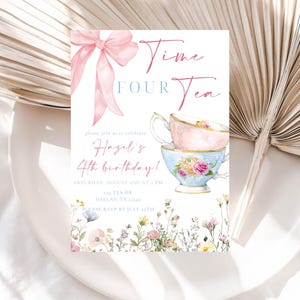 May include: A floral tea party invitation with the text "Time Four Tea" and "Hazel's 4th birthday!" in pink and blue. The design includes a pink bow, teacups, and floral accents. The invitation is on a white background.