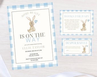 May include: A blue and white checkered baby shower invitation with a bunny illustration. The invitation reads "Some bunny is on the way" and includes the name Ellie Taylor, the date and time of the shower, and the address. There are also two smaller cards, one for a book request and one for a diaper raffle.
