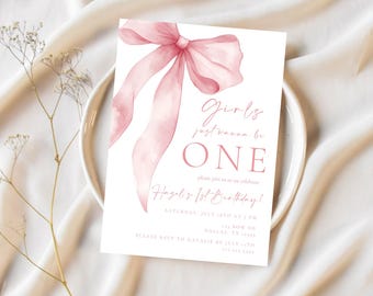 May include: Pink watercolour bow with the text "Girls just wanna be ONE" and "Hazel's 1st Birthday!" The invitation includes the date, time, and RSVP information.