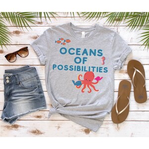 Ozeane der Möglichkeiten Sommer T-Shirt, Bibliothekar Leser Shirt, Bücherwurm T-Shirt, Geschenk für Buchliebhaber, Bücherwurm Tee Merch, Bibliophile