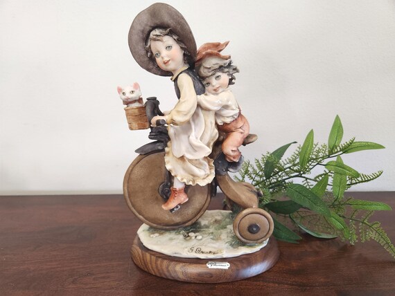 Vintage Giuseppe Armani Capodimonte Figurine: Kids on Tricycle