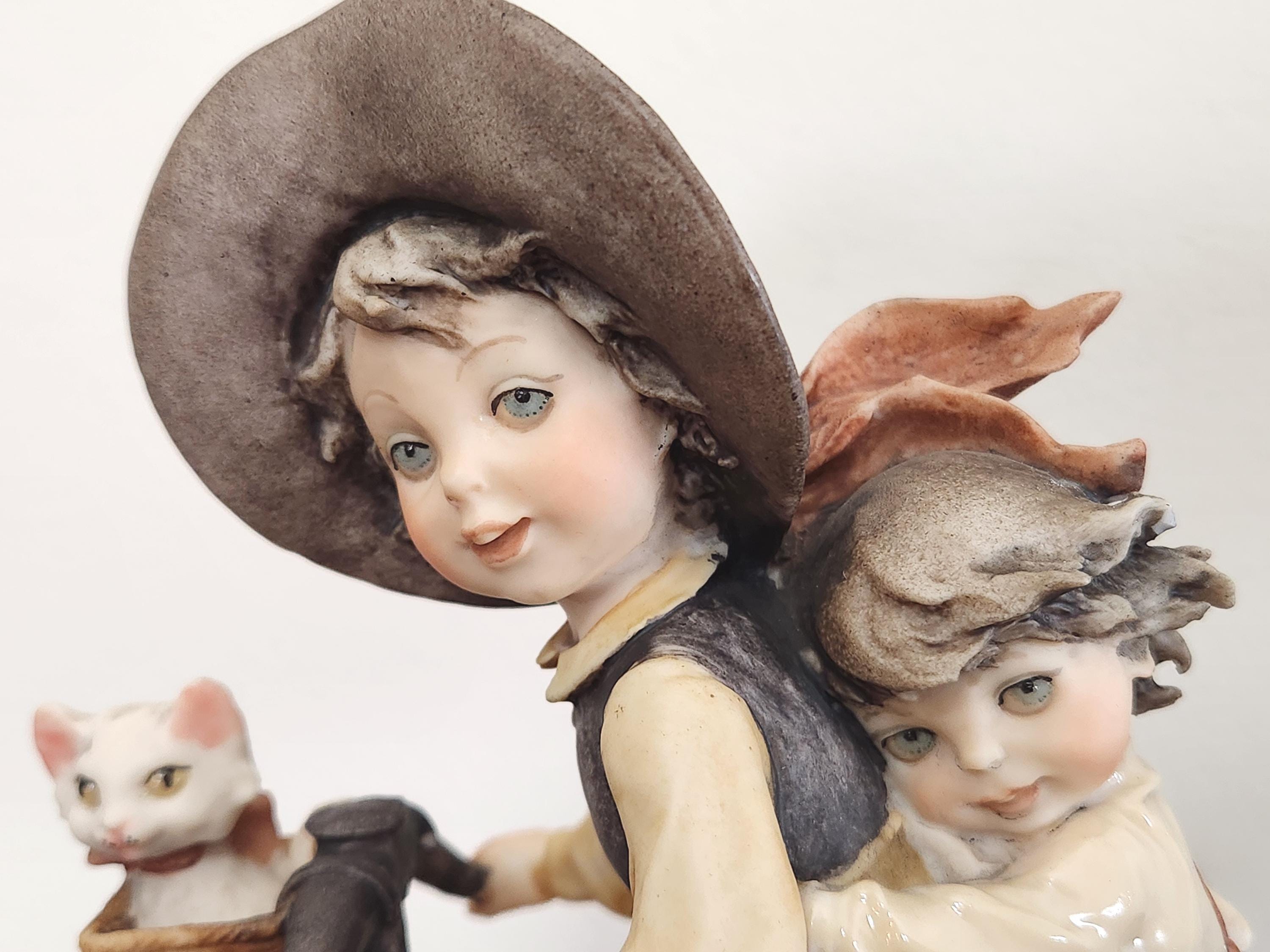 Vintage Giuseppe Armani Capodimonte Figurine: Kids on Tricycle