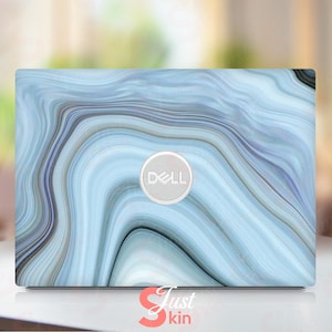May include: A blue and white marble laptop skin with the Dell logo in the center.