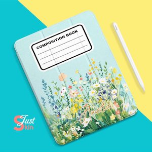 May include: A light blue iPad case with a floral design and the text "COMPOSITION BOOK" and "Amelia" in gold lettering.