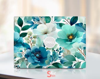 May include: A laptop skin with a watercolour floral design. It features large teal, blue, and white flowers with green leaves and stems. The Dell logo is visible. The words "Just Skin" are at the bottom.