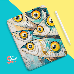 May include: A colorful iPad case with a design of blue and white fish with yellow eyes. The case has the name "Amelia" written in gold script.