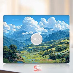May include: A laptop skin featuring a scenic landscape with terraced fields, mountains, and a bright blue sky filled with fluffy white clouds. The Dell logo is visible. The words "Just Skin" are at the bottom.