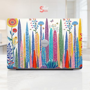 May include: A Dell laptop skin featuring a vibrant, multi-colored botanical pattern on a white background. The design displays various tall, stylized plants, ferns, and flowers in shades of red, blue, yellow, pink, and green, with small butterflies and bees.