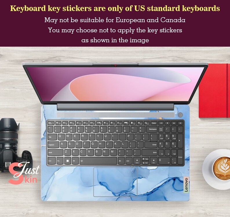 May include: A blue and white laptop skin with a marble pattern. The skin is designed to fit a US standard keyboard. The text "Lenovo" is visible on the bottom right corner of the skin.