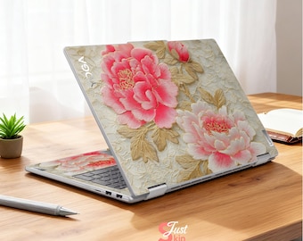 May include: A laptop featuring a floral design with large pink peonies and gold-coloured leaves. The laptop is open on a wooden table, with a pen and small plant nearby. The laptop case has the word "YOGA" printed on it.