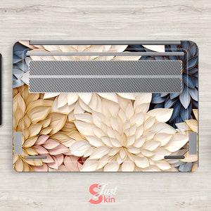 May include: A laptop skin with a floral design featuring white, beige, and blue paper flowers. The design has a 3D effect, making the flowers appear to be layered. The skin is made of high-quality vinyl and is easy to apply and remove.