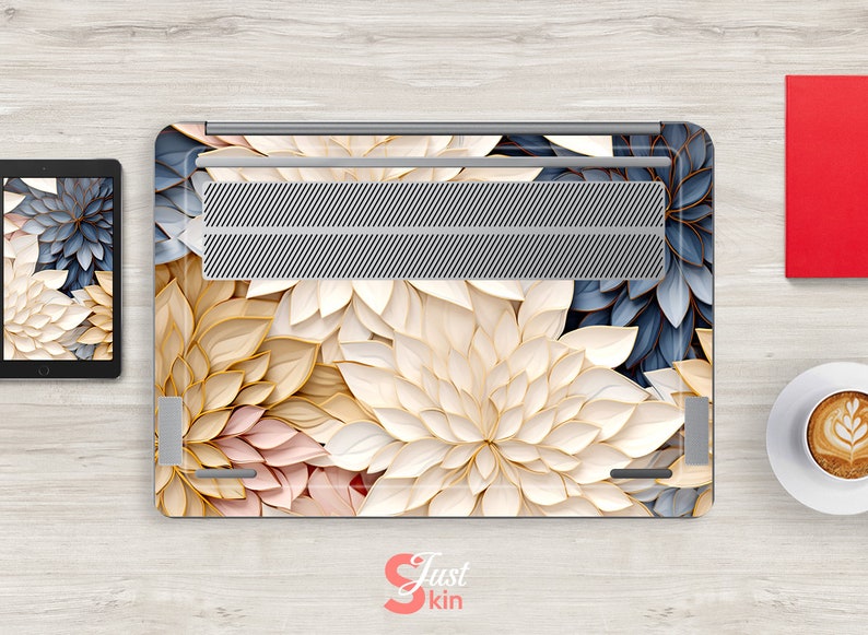 May include: A laptop skin with a floral design featuring white, beige, and blue paper flowers. The design has a 3D effect, making the flowers appear to be layered. The skin is made of high-quality vinyl and is easy to apply and remove.