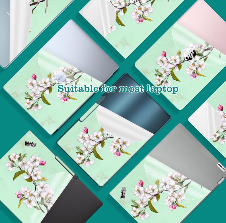 May include: Laptop skins with a floral design. The skins feature a light green background with a watercolor-style branch of white and pink flowers. The text "Suitable for most laptop" is visible.