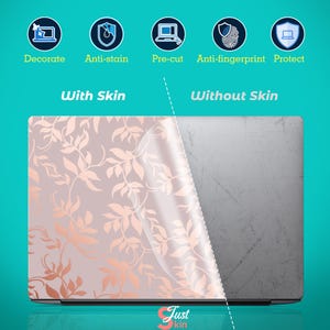 May include: Laptop skin with a floral design in rose gold and blush pink. The skin is partially peeled back to show the laptop's original surface. Text on the image includes "Decorate", "Anti-stain", "Pre-cut", "Anti-fingerprint", and "Protect". The brand name "Just kin" is also visible.