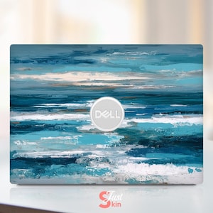 May include: A laptop skin featuring an abstract ocean painting in shades of blue, white, and gray. The design has a textured, brushstroke effect, with the Dell logo visible. The bottom right corner has the text "Just Skin".