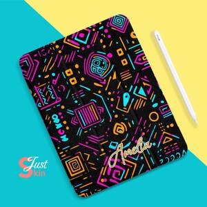 May include: A black iPad case with a colorful geometric pattern and the name "Amelia" written in gold script.