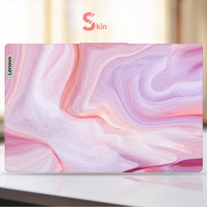 May include: Pink and white marble laptop skin with the word "Lenovo" in the top left corner.
