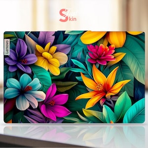 May include: A colorful floral design with vibrant pink, yellow, blue, and green flowers on a dark green background. The design features a variety of tropical flowers and leaves. The text "Lenovo" is visible in the upper left corner.