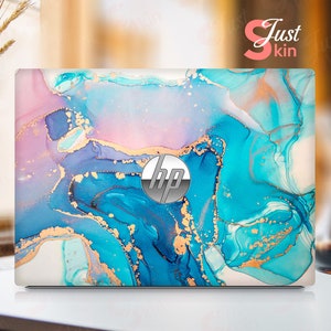 May include: Laptop skin with an abstract design featuring blue, pink, and gold swirls. The skin has the HP logo in the center.